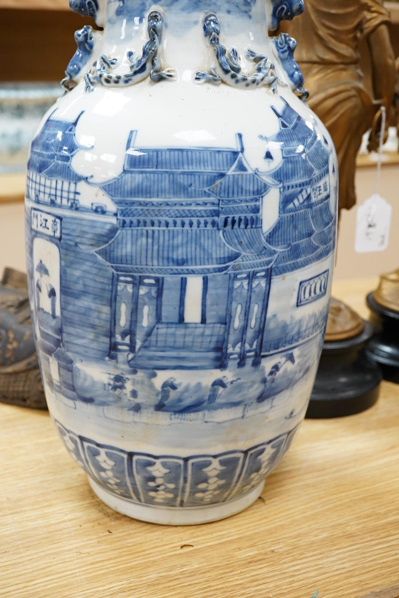 A large 19th century Chinese blue and white ‘city gates’ vase, 47cm